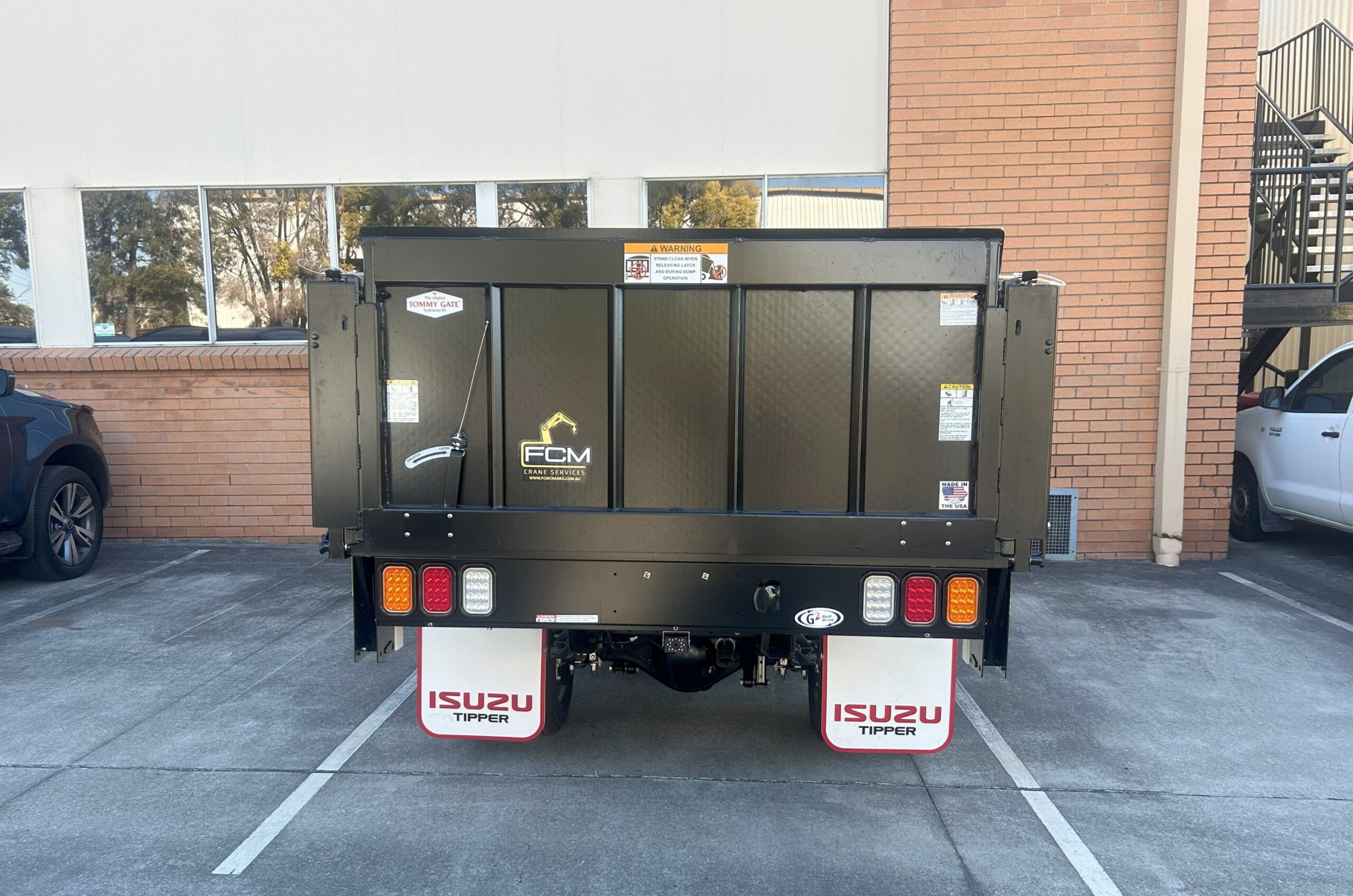 Rear view of an truck with FCM-branded tailgate/liftgate
